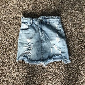 Light wash ripped jean skirt